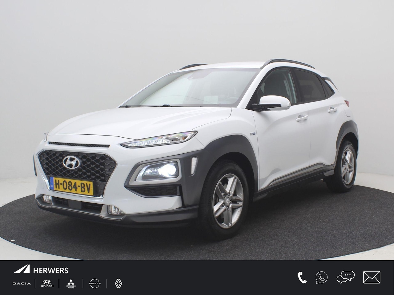 Hyundai Kona - 1.6 GDI HEV Premium / Trekhaak / Lederen bekleding / HUD Display / Navigatie / Adaptieve C - AutoWereld.nl