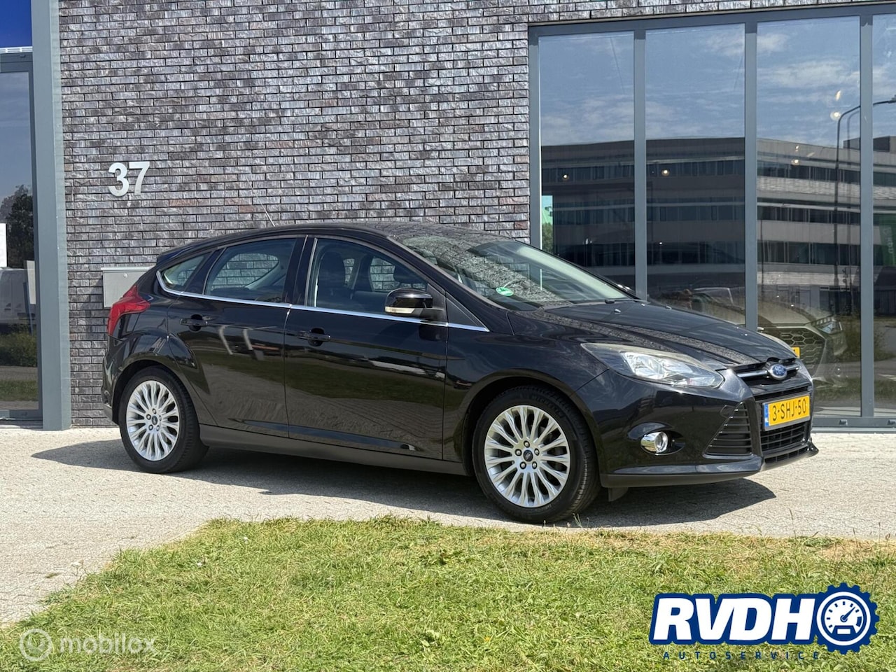 Ford Focus - 1.0 EcoBoost Titanium |Trekh|Navi|Clima|Cruise - AutoWereld.nl