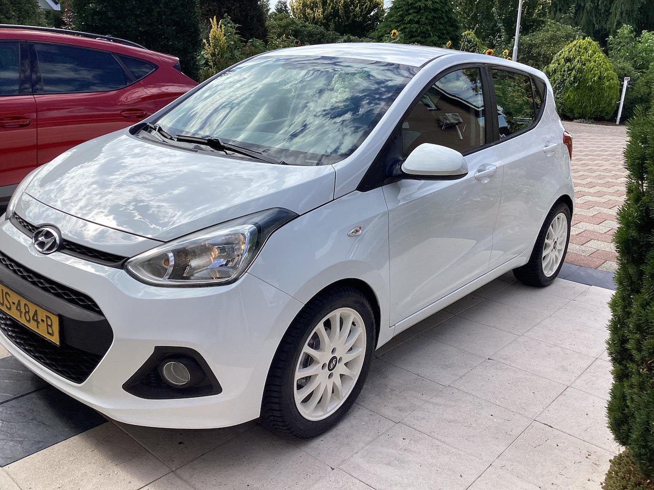 Hyundai i10 - 1.0i i-Motion Comfort LMV velgen met Michelin all seasens green banden 195x50x16 inch - AutoWereld.nl