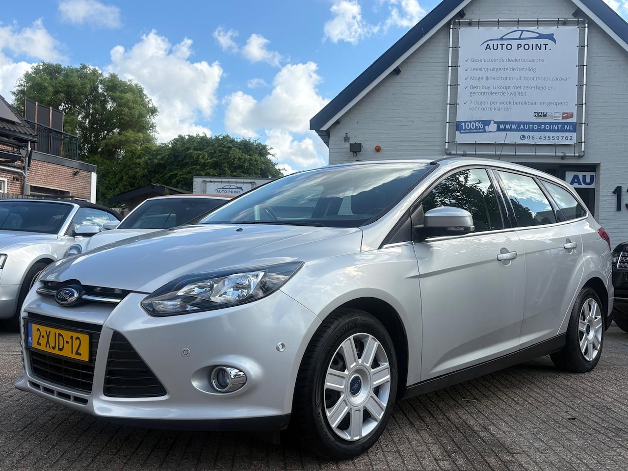 Ford Focus Wagon - 1.6 TDCI TITANIUM/CLIMATE/NAVI/CRUISE/LANE - AutoWereld.nl