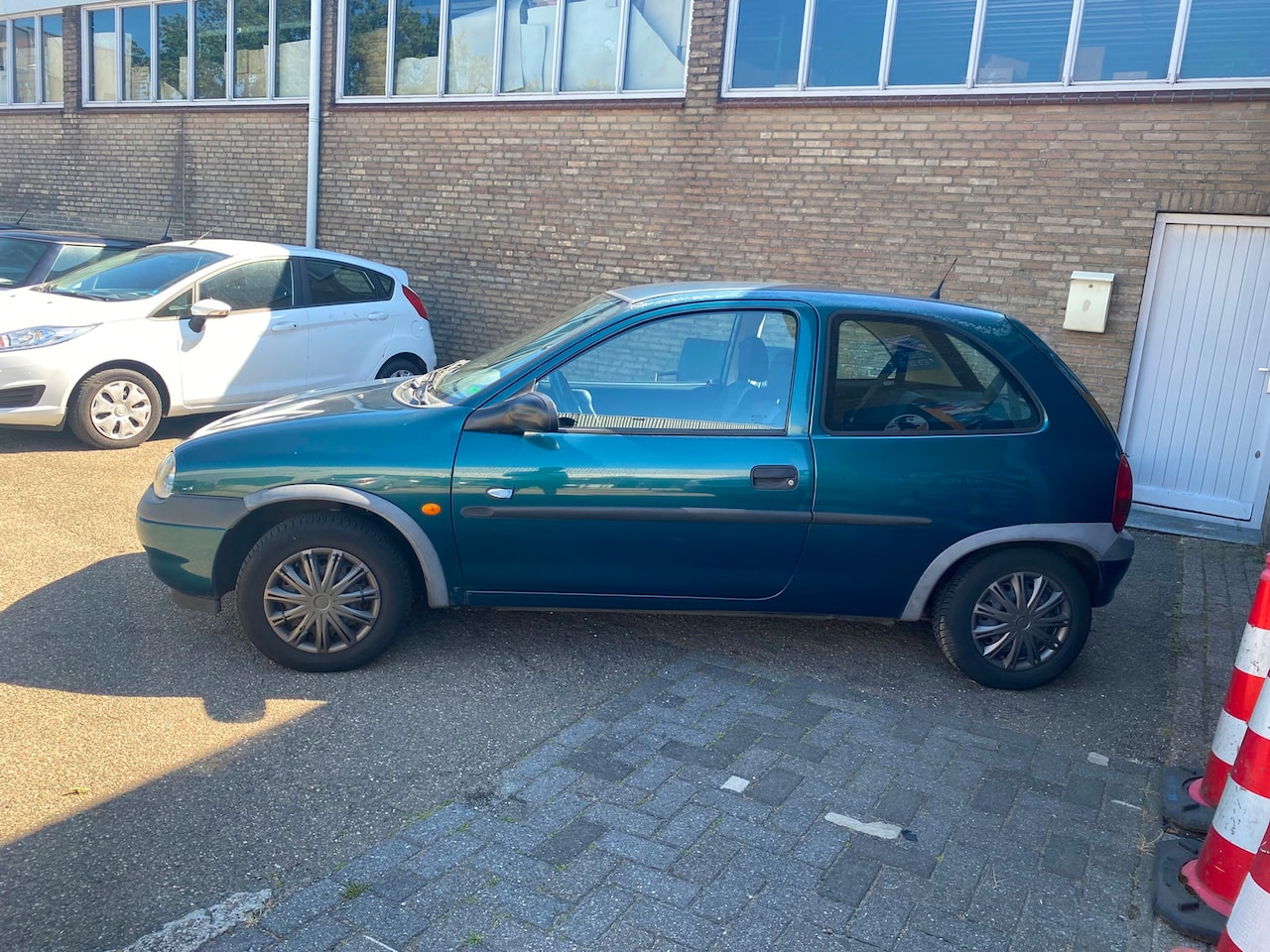 Opel Corsa - 1.2i-16V Strada 1.2i-16V Strada - AutoWereld.nl