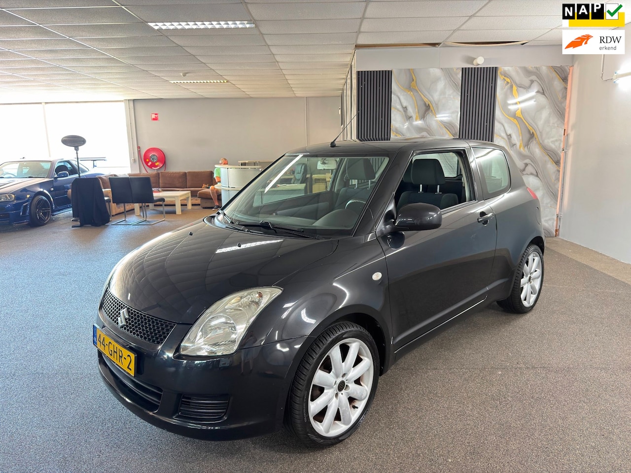 Suzuki Swift - 1.3 Comfort Apk Nieuw,Airco,Bluetooth,E-Ramen,Lm velgen,N.A.P,2 sleutels+boekjes!! - AutoWereld.nl