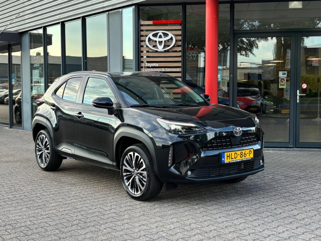 Toyota Yaris Cross - 1.5 Hybr 130 Exec | Nav | Elek.a.klep | Head UP | JBL | Dodehoek - AutoWereld.nl