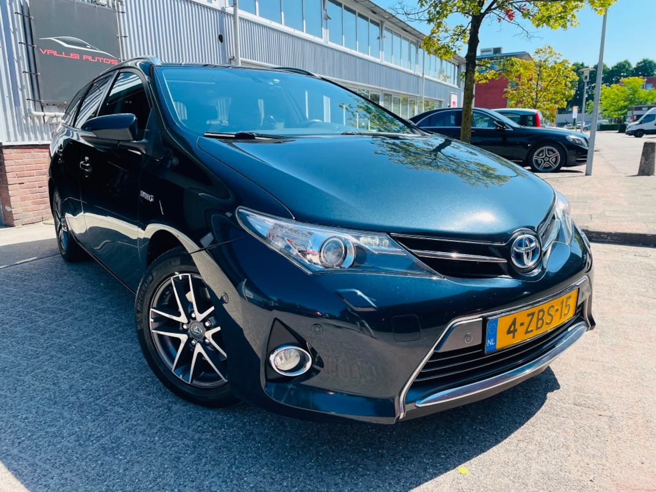 Toyota Auris Touring Sports - 1.8 Hybrid Lease+ PANO XENON PDC - AutoWereld.nl