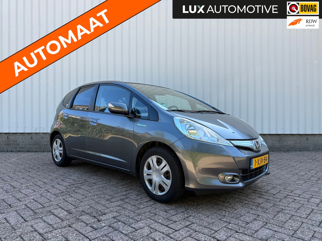 Honda Jazz - 1.4 Hybrid Elegance 1.4 Hybrid Elegance, Pano, Cruise, Climate Control, 4-seizoenenbanden - AutoWereld.nl