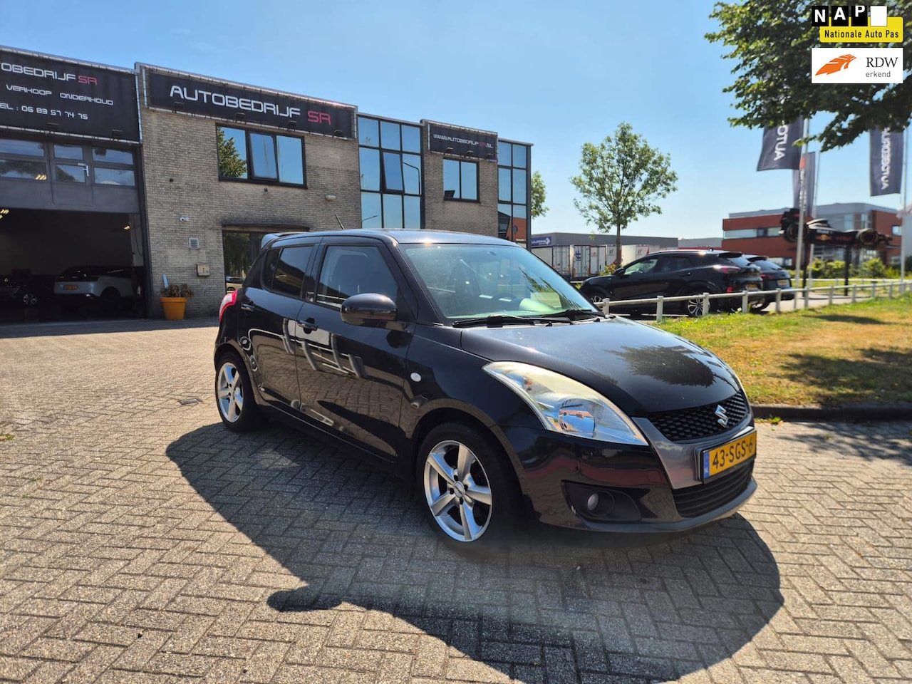 Suzuki Swift - 1.2 Exclusive EASSS Cruise! Airco! Stoelverwarming! Keyless Go! Nap! 5 Deurs! NL Auto! - AutoWereld.nl