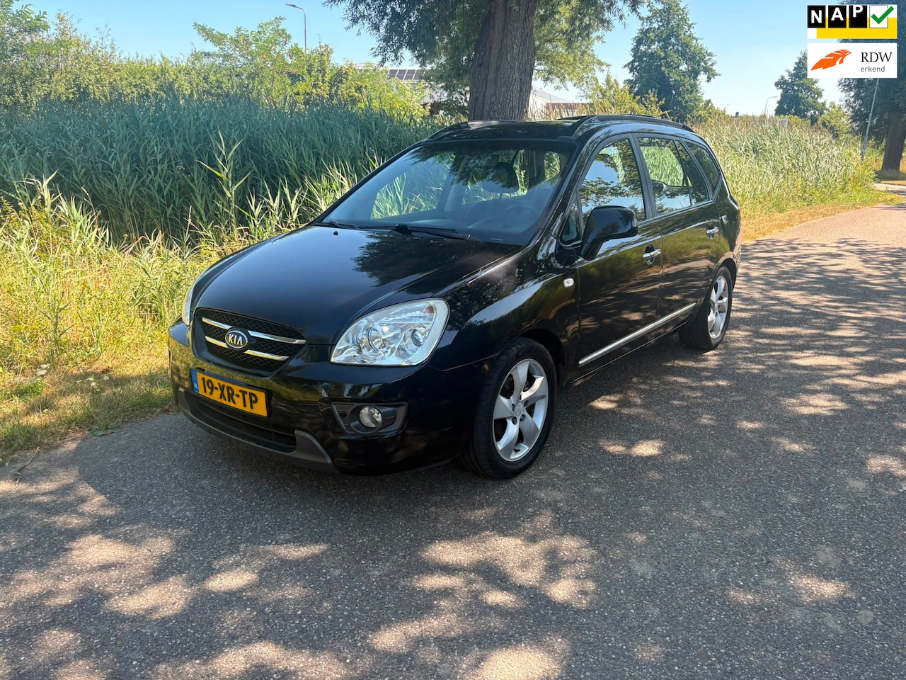 Kia Carens - 2.0 CVVT X-clusive Airco Cruise Navi Leder Bekleding Pdc Voor En Achter Trekhaak 7pers - AutoWereld.nl