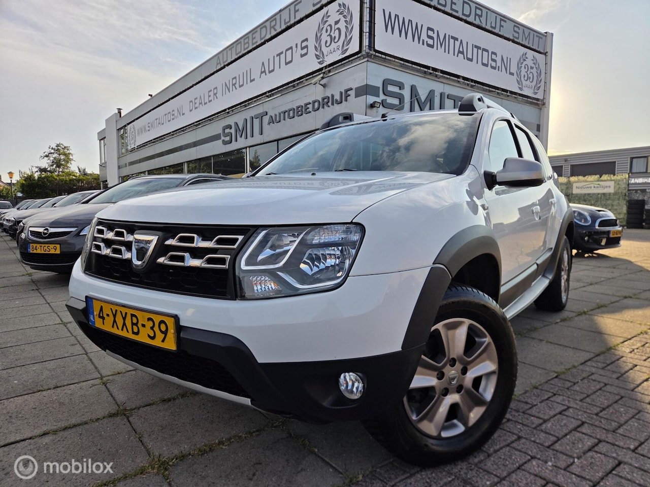 Dacia Duster - 1.2 TCe 4x2 Prestige AC/CC/NAV/Trekhaak - AutoWereld.nl
