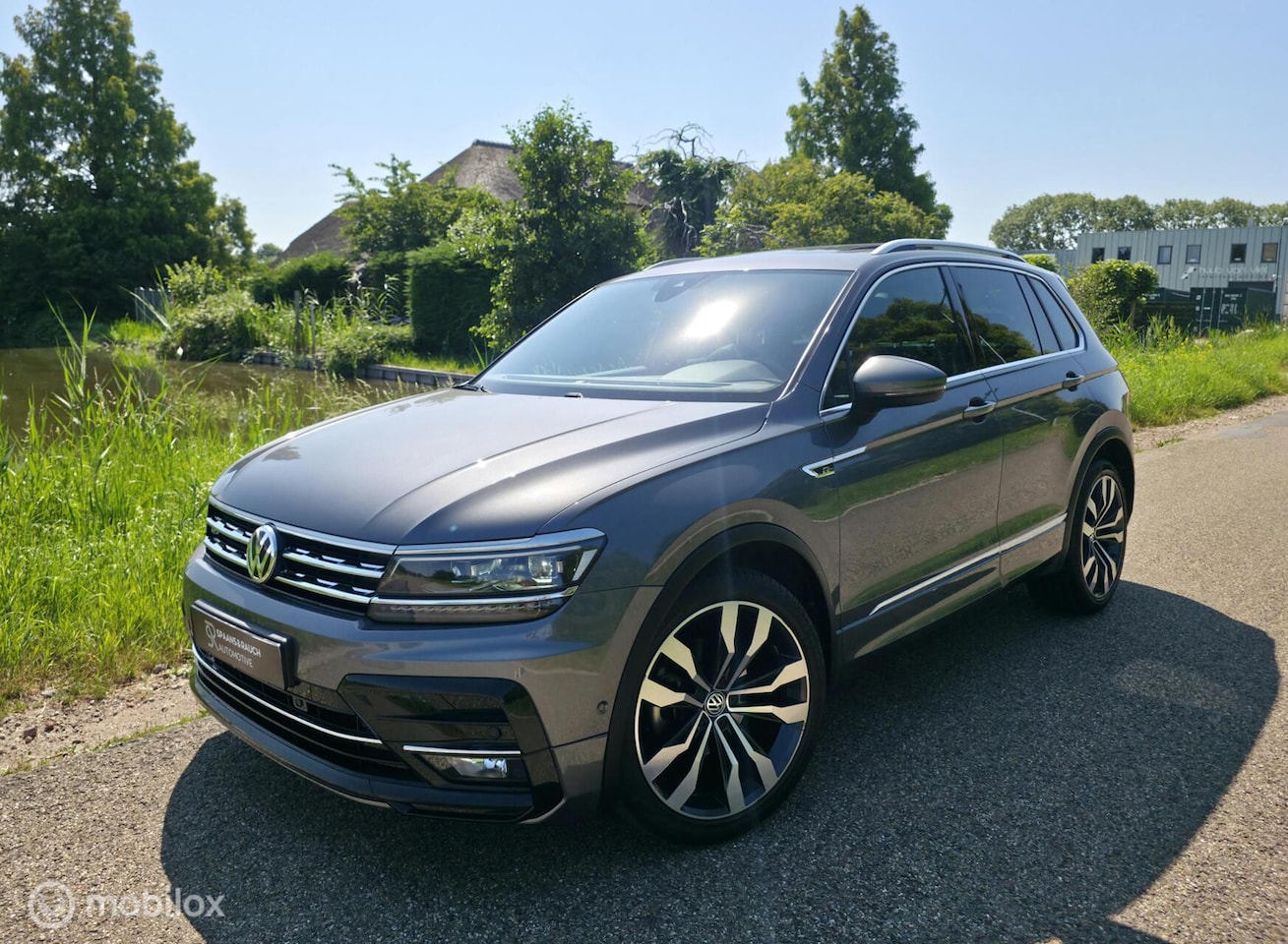 Volkswagen Tiguan - 1.5 TSI / 3x R-Line / Pano / Carpl. / Luxe - AutoWereld.nl