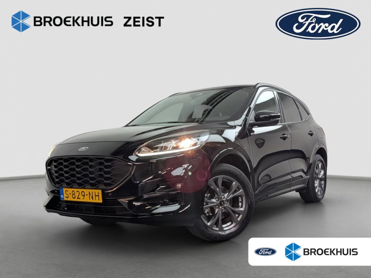 Ford Kuga - 2.5 PHEV ST-Line | Dealer o.h. | Achteruitrijcamera | Airco (automatisch) | Privacy-glass - AutoWereld.nl