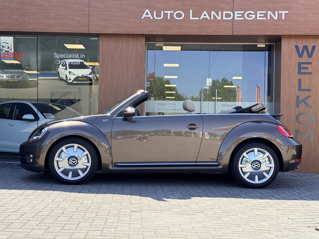 Volkswagen Beetle Cabriolet - 1.4 TSI Design 70's Zeer uniek! - AutoWereld.nl