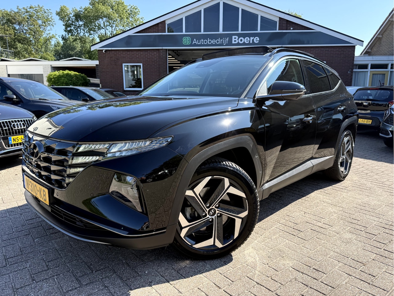 Hyundai Tucson - 1.6 T-GDI HEV Premium Sky Panoramadak, 19''Lmv, 360 camera - AutoWereld.nl