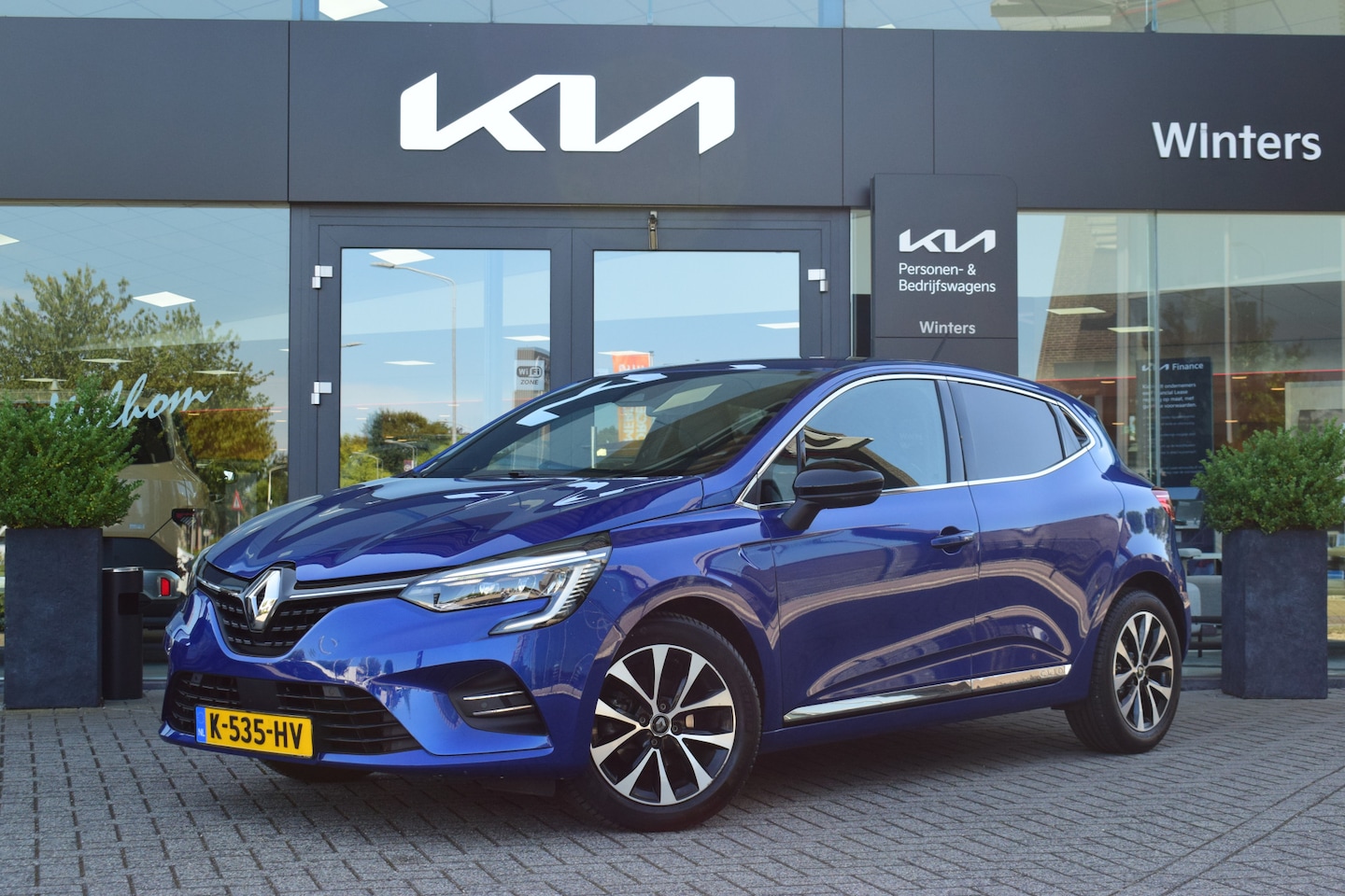 Renault Clio - 1.0 TCe Intens | Navigatie | Camera | Cruise + Climate Control | Sensoren Voor & Achter | - AutoWereld.nl