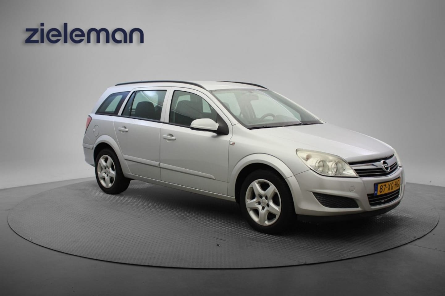 Opel Astra Wagon - 1.6 Business - Airco, Cruise, Trekhaak - AutoWereld.nl