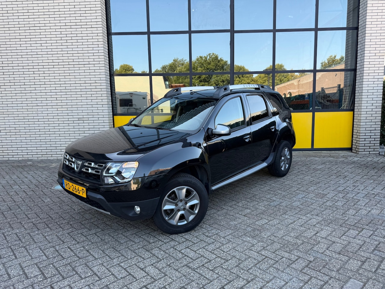 Dacia Duster - 1.2 Tce 4x2 Prestige 1.2 TCe 4x2 Prestige, Leer, Airco, Camera - AutoWereld.nl
