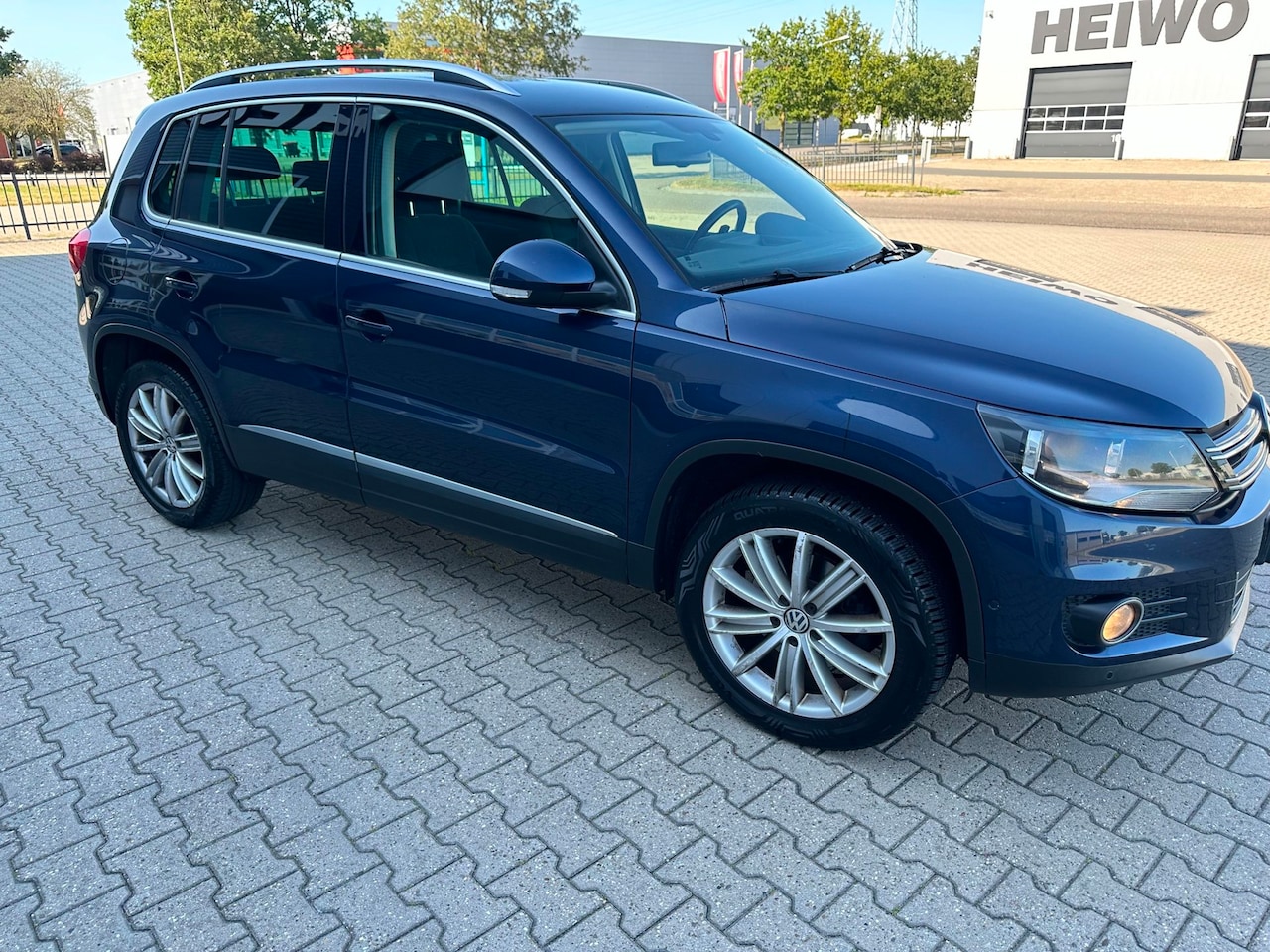 Volkswagen Tiguan - 1.4 TSI Sport&Style - AutoWereld.nl