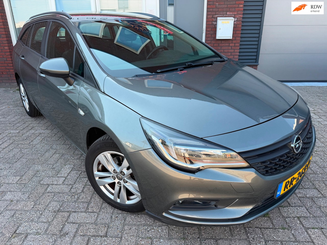 Opel Astra Sports Tourer - 1.0 Business Executive / Navi / PDC / Clima / Cruise - AutoWereld.nl