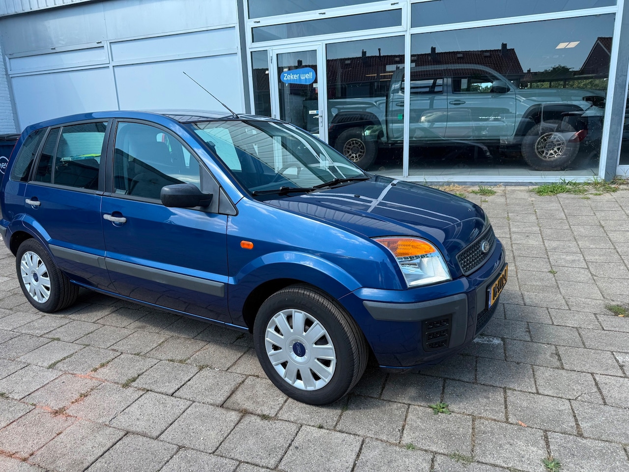 Ford Fusion - Ford Fusion 1.4-16V Cool & Sound (2010) – Slechts 77.344 km! - AutoWereld.nl