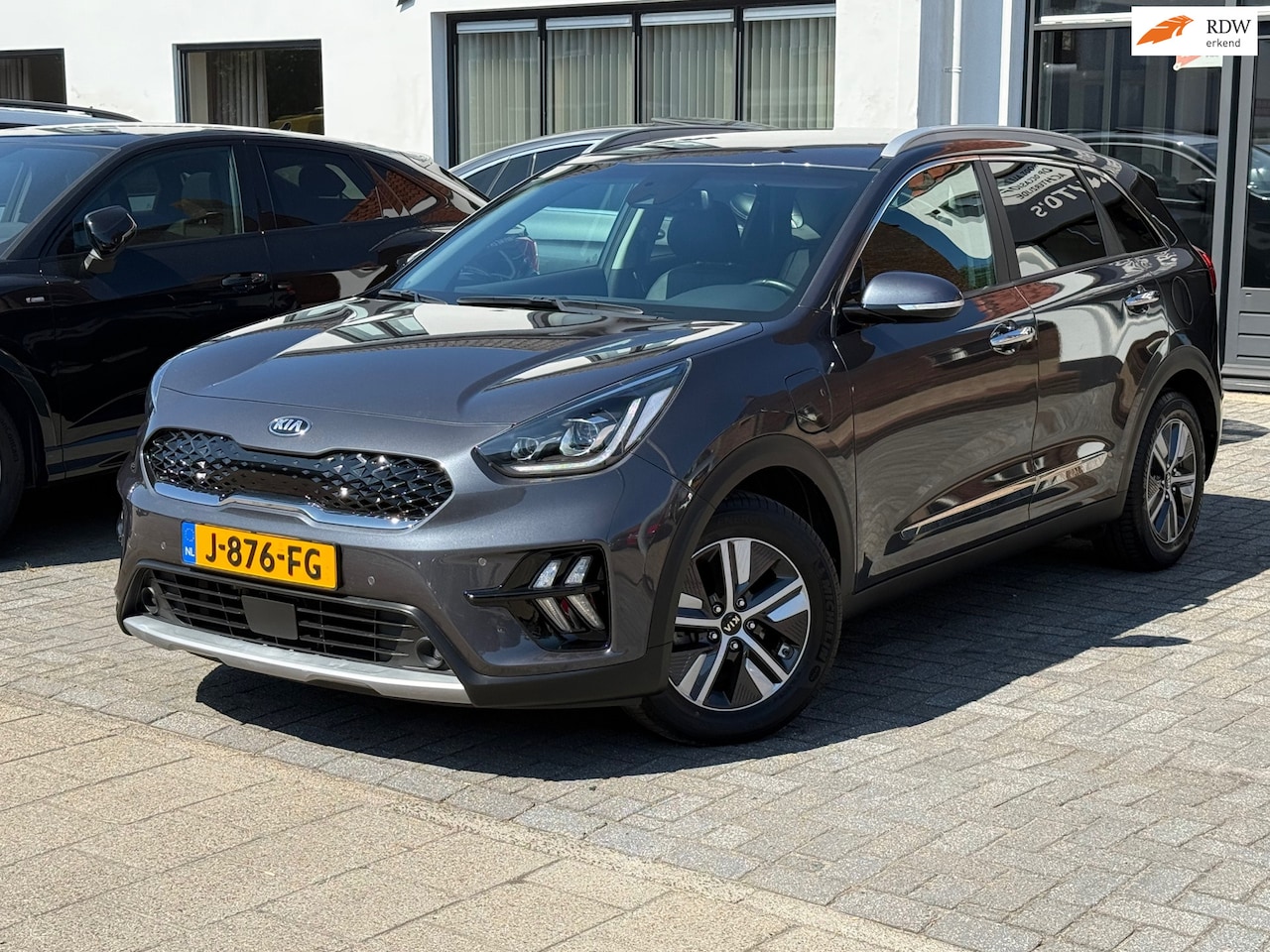 Kia Niro - 1.6 GDi PHEV DynamicPlusLine 1.6 GDi PHEV DynamicPlusLine, Stoel/stuurwarming, Lederen bekleding, Trekhaak - AutoWereld.nl