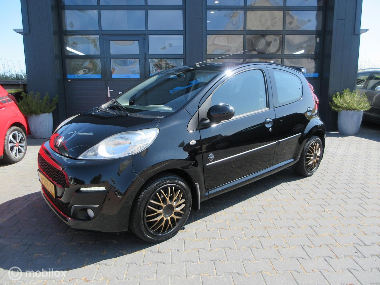 Peugeot 107 - 1.0 Sportium 5drs 144dkm Airco Org NL Sportief! - AutoWereld.nl