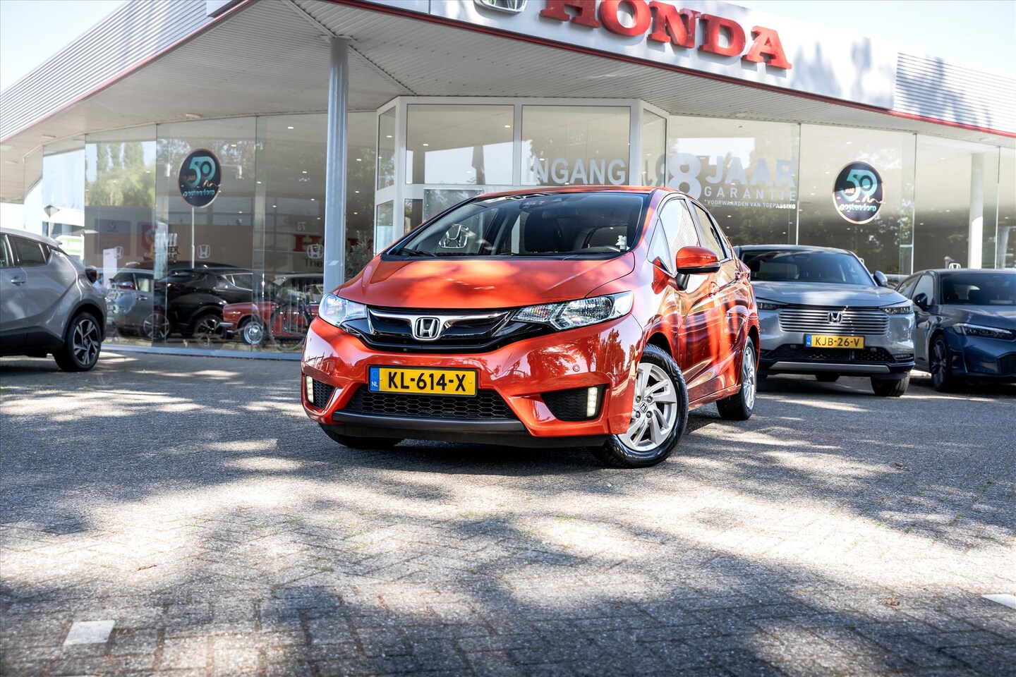 Honda Jazz - 1.3 i-VTEC Comfort | "Orange is the new Black" Navi | Stoelverwarming | PDC voor en achter - AutoWereld.nl