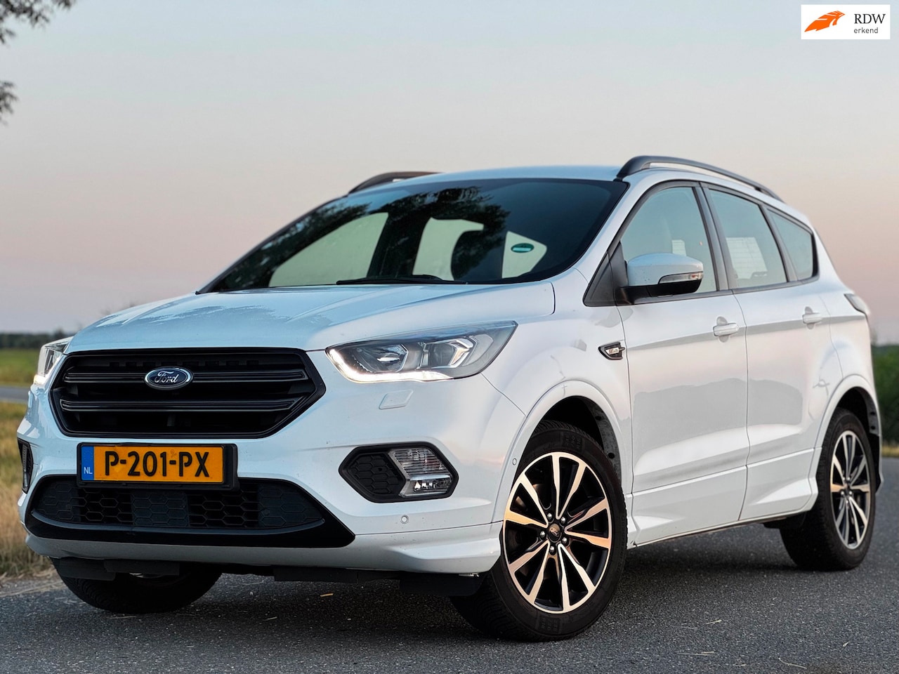 Ford Kuga - 1.5 EcoBoost ST Line|6BAK|NAVI|CAMERA|HALFLEDER|STOELVERW|CRUISE|TREKHAAK|2XSLEUTELS - AutoWereld.nl
