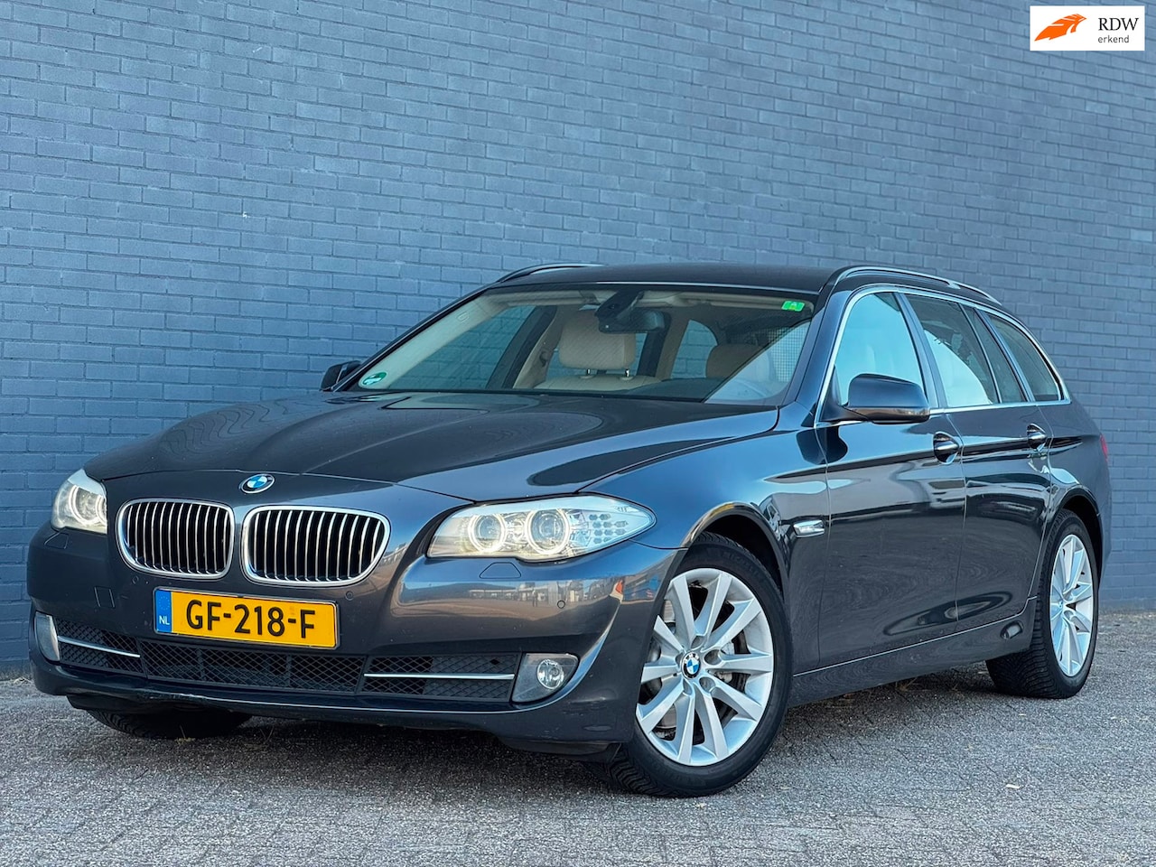 BMW 5-serie Touring - 520d High Executive|6BAK|LEDER|NAVI|VOL ONDERHOUDEN - AutoWereld.nl