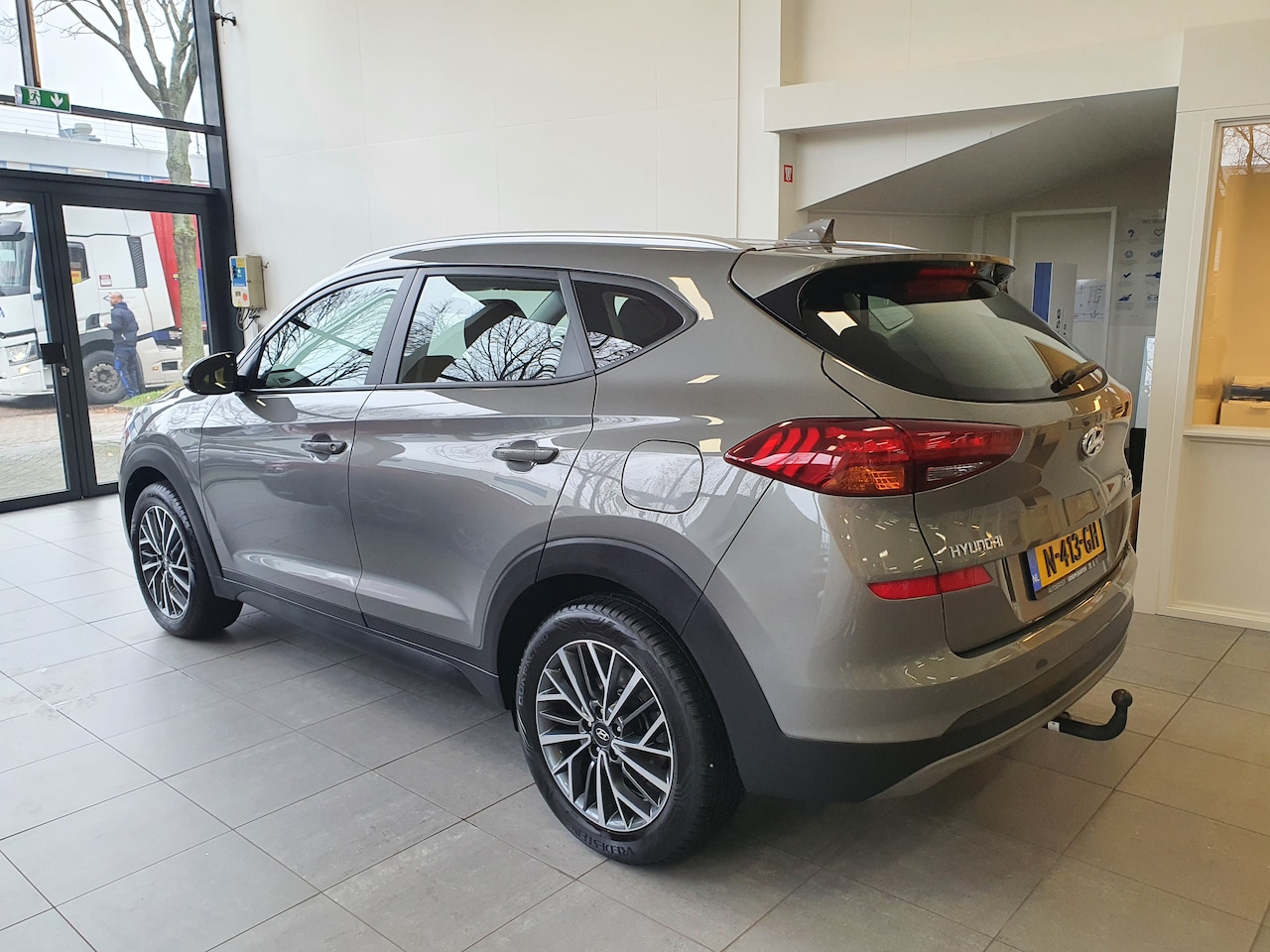 Hyundai Tucson - 1.6 T-GDI Premium Automaat Alarm Trekhaak Stoelverwarming Stuurverwarming Navigatie Parkeersensoren - AutoWereld.nl