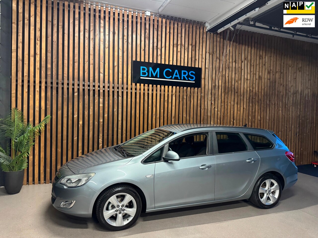 Opel Astra Sports Tourer - 1.4 Turbo Edition Airco,Trekhaak,Navi - AutoWereld.nl