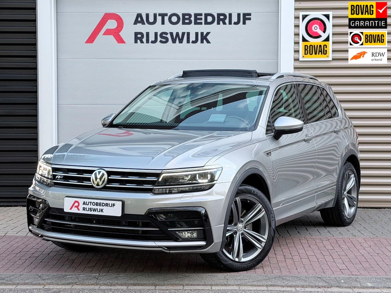 Volkswagen Tiguan - 2.0 TSI 4Motion Highline Pano/Camera/AppleCar - AutoWereld.nl