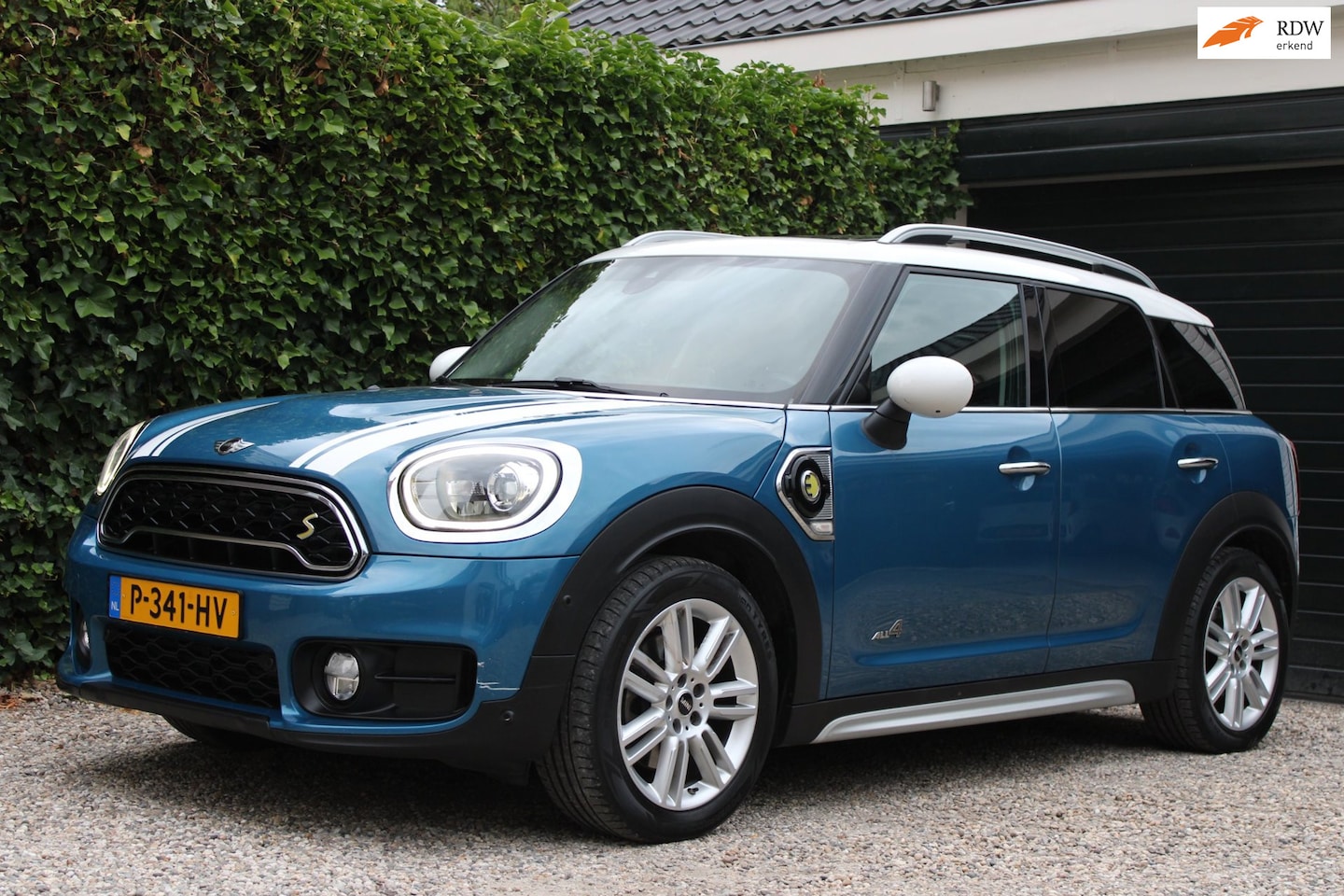 MINI Countryman - 1.5 Cooper S E ALL4 Chili | Panoramadak | HUD | ACC | Achteruitrijcamera - AutoWereld.nl
