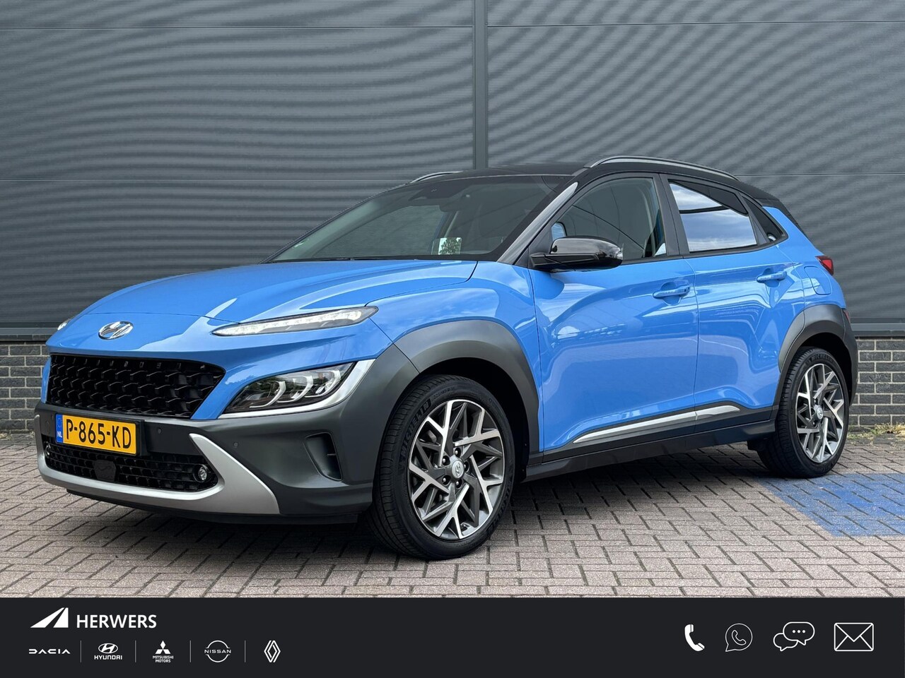 Hyundai Kona - 1.6 GDI HEV Premium / Navigatie / Apple Carplay & Android Auto / Lederen Bekleding / Stuur - AutoWereld.nl