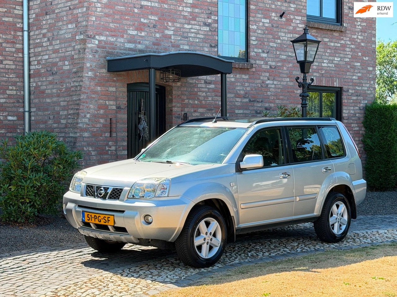 Nissan X-Trail - 2.5 Sport Outdoor Aut 4WD Panodak Leer Cruise Navi - AutoWereld.nl