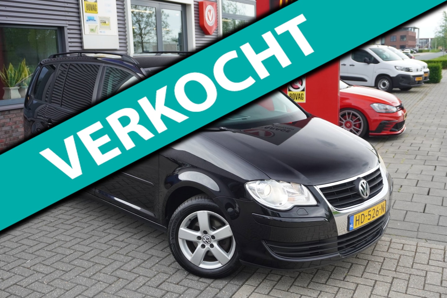 Volkswagen Touran - 1.6 Trendline 7p. / Trekhaak / Stoelverwarming / Cruise control - AutoWereld.nl