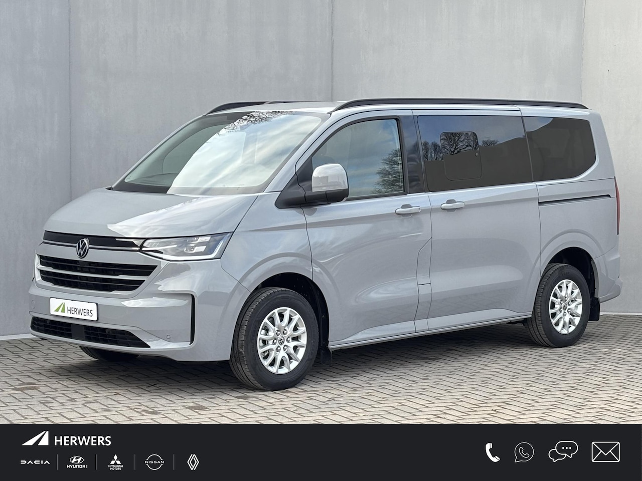 Volkswagen e-Transporter Caravelle - 32 L1H1 Life 64 kWh Automaat 8 PERSOONS / garantie tot 12-2027 / WLTP 305 km / Stone Gray - AutoWereld.nl