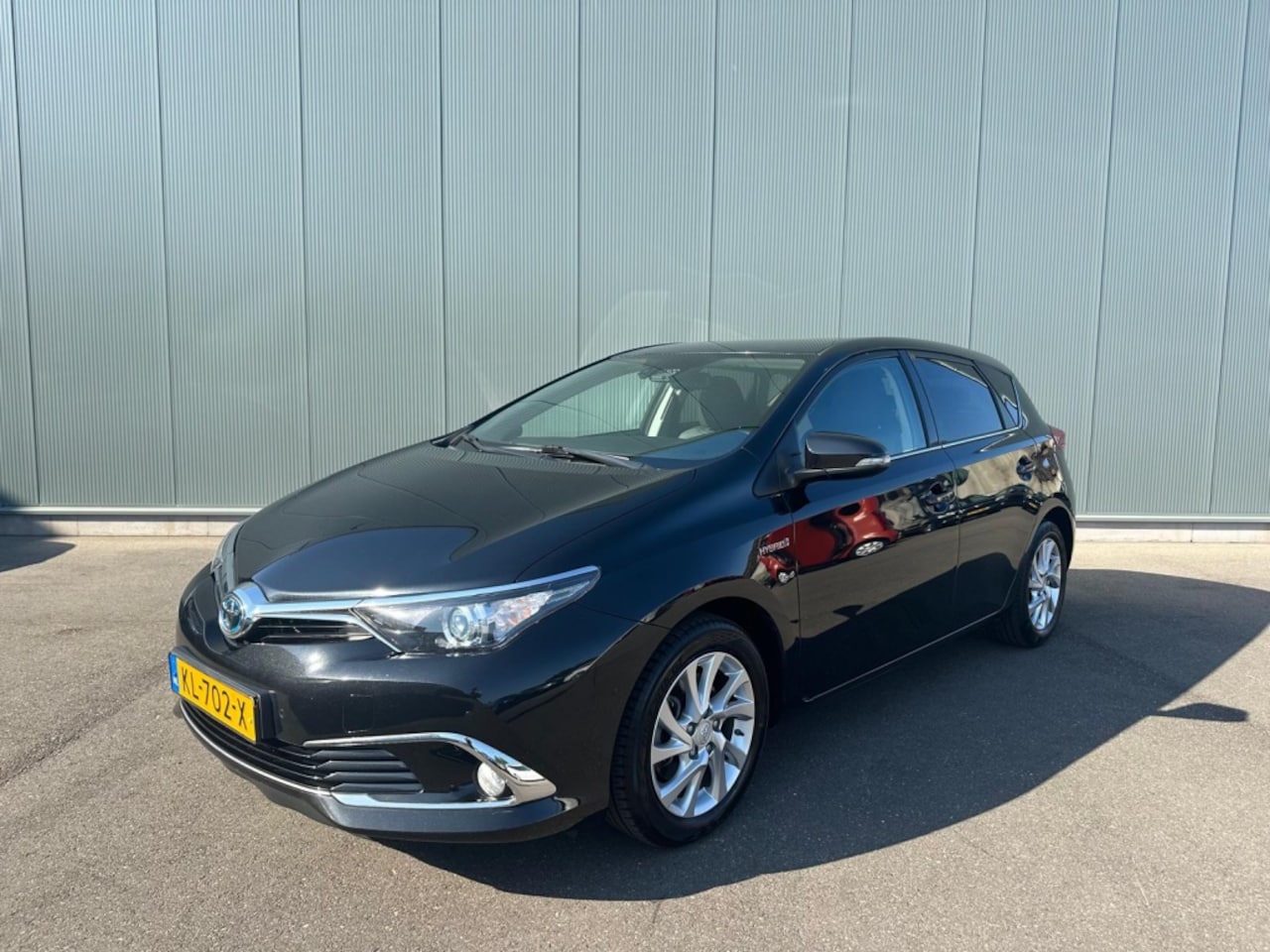 Toyota Auris - 1.8 Hybrid Executive | NETTO 7500,- | CAMERA | HALF LEDER | NAP ! - AutoWereld.nl