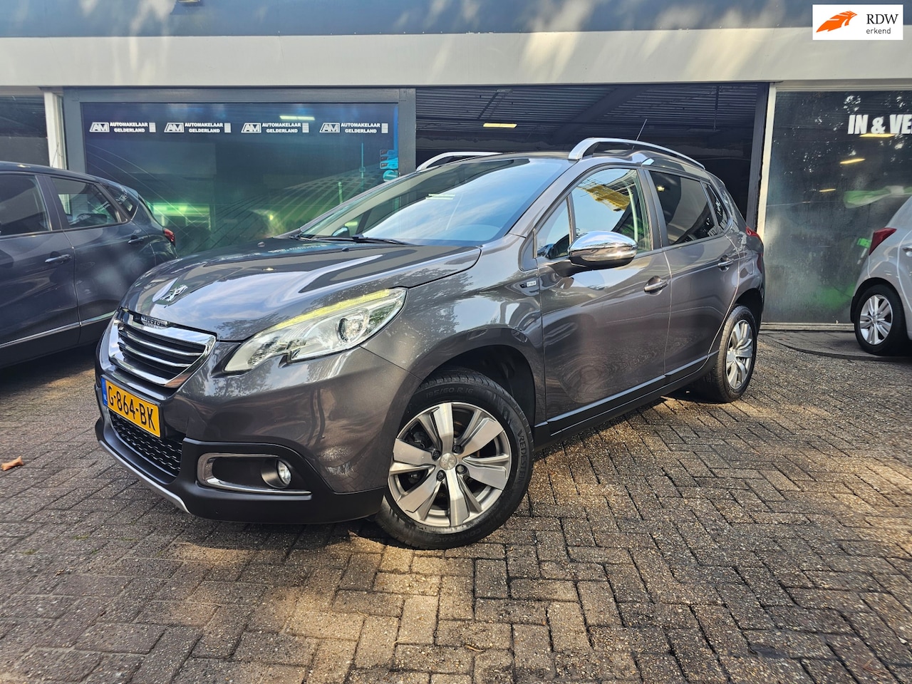 Peugeot 2008 - 1.2 80 PK Allure | 3/6 OF 12 MND GARANTIE | NAVI |CRUISE | LMV | NIEUWE APK | - AutoWereld.nl
