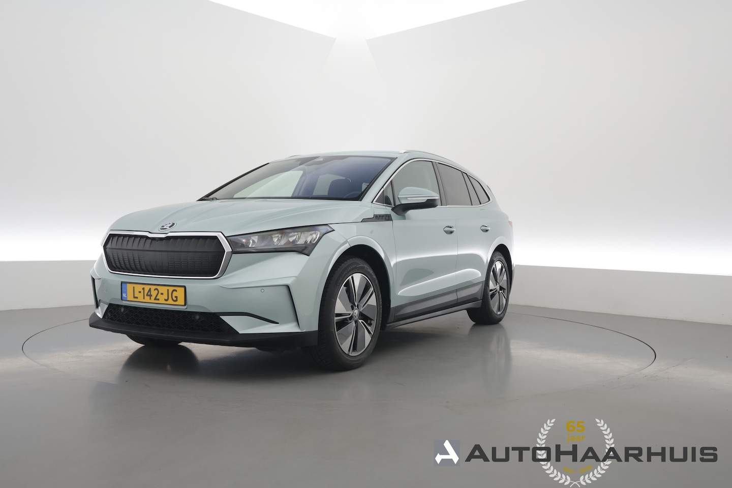 Skoda Enyaq iV - 60 | RIJKLAAR!! | Warmtepomp | Adapt. Cruise | Trekhaak | Stoel- Stuurverw. | Memory | Key - AutoWereld.nl