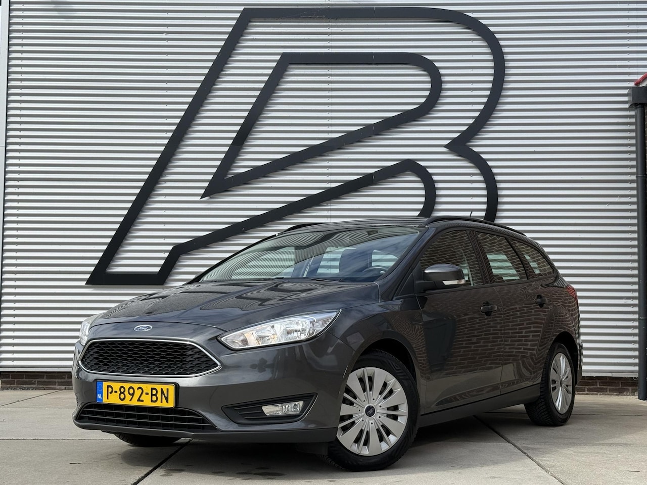 Ford Focus Wagon - 1.0 Titanium Edition 2e Eigenaar|Navi|Airco|Cruise|Stoelverw|Elek Ramen|PDC|Nieuwe APK bij - AutoWereld.nl