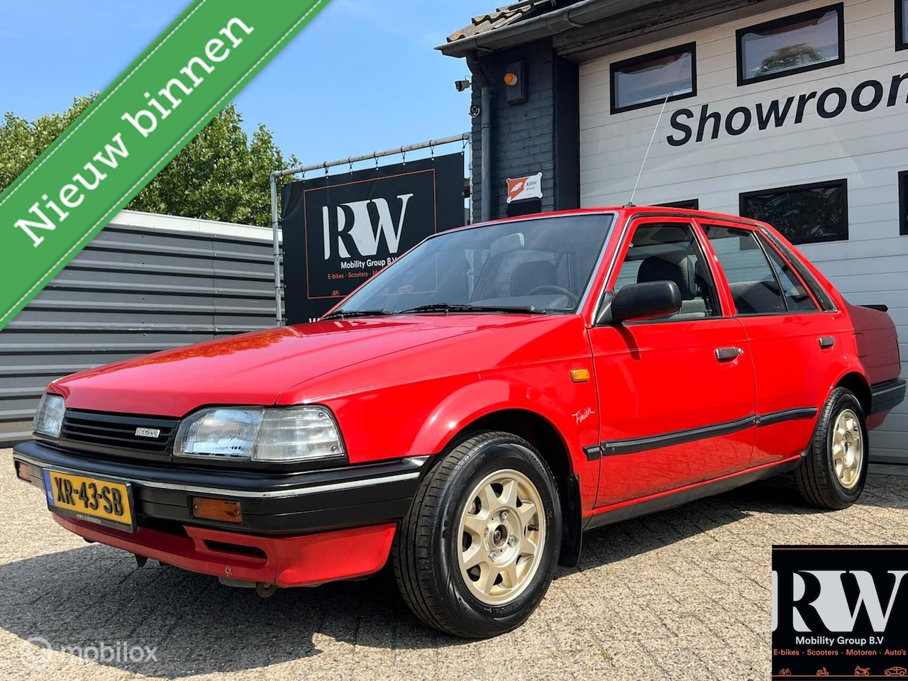 Mazda 323 Fastbreak - 1.3i Comfort UNIEKE AUTO*APK TOT 06-2028 - AutoWereld.nl