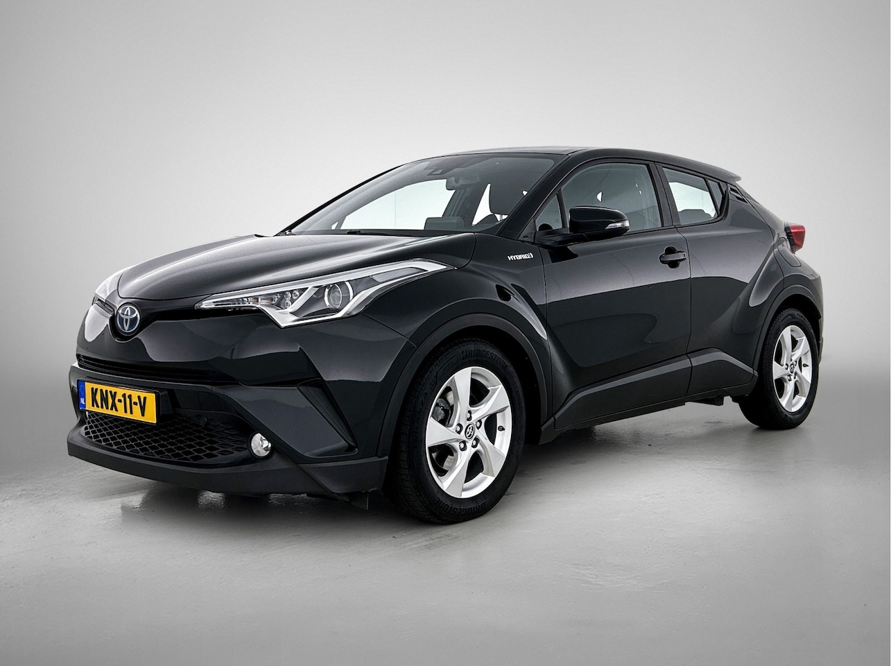 Toyota C-HR - 1.8 Hybrid Active | Trekhaak - AutoWereld.nl