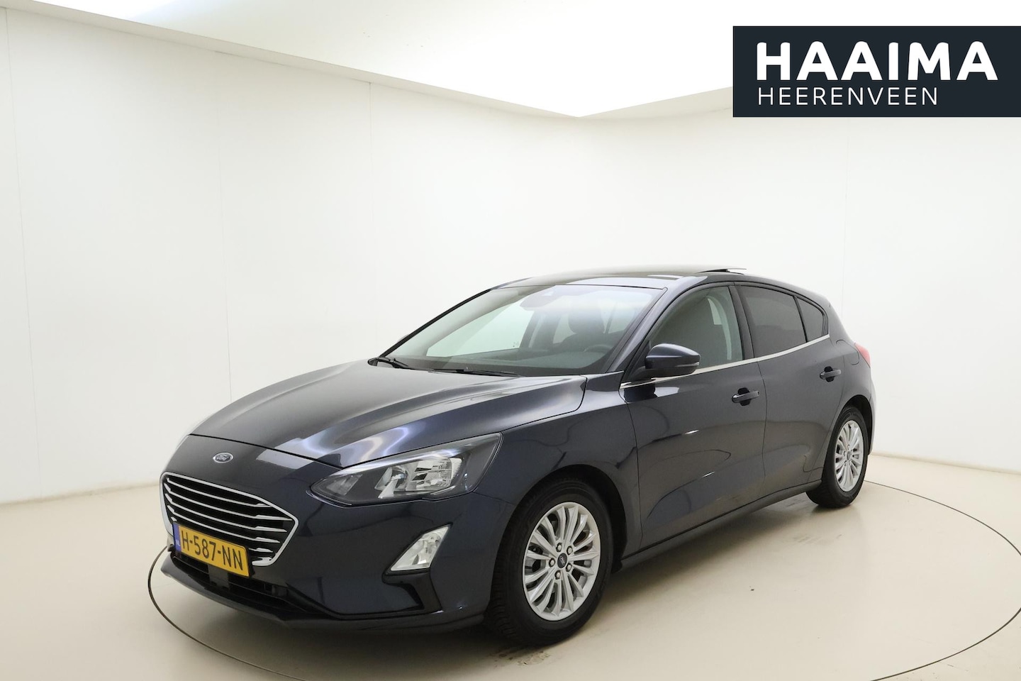 Ford Focus - 1.0 EcoBoost Titanium Business | Panoarama dak | Navigite | LM velgen - AutoWereld.nl