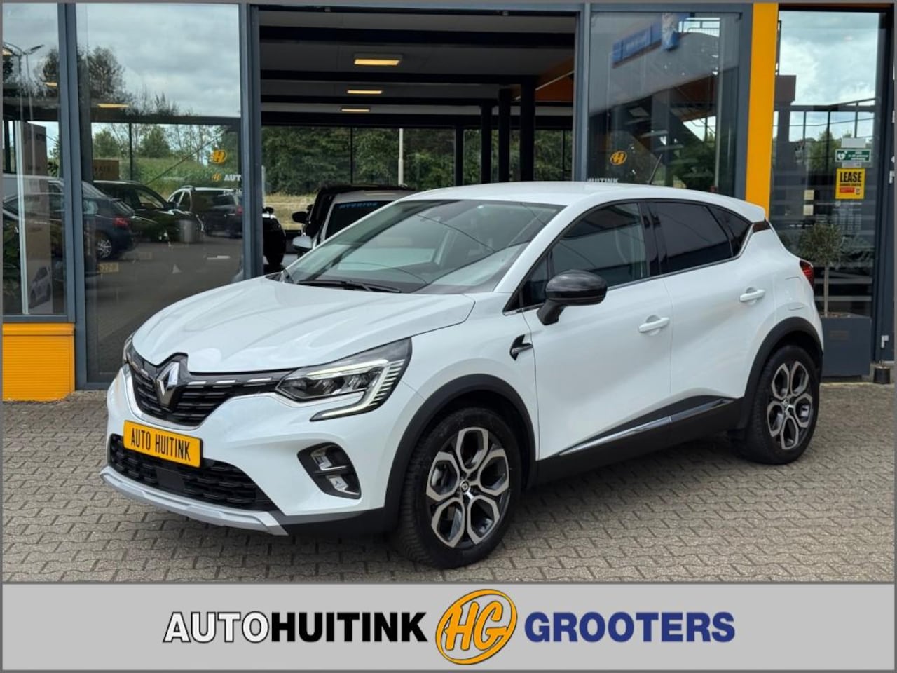 Renault Captur - 1.6 E-Tech Plug In Intens - camera - navi - climate control - AutoWereld.nl