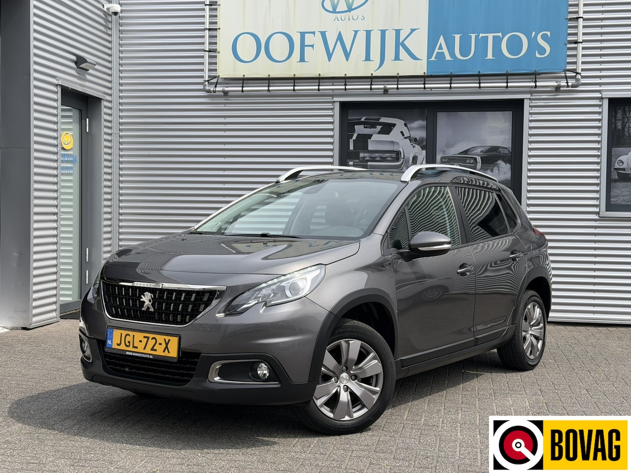 Peugeot 2008 - 1.2 PureTech Allure Clima Navi CarPlay - AutoWereld.nl