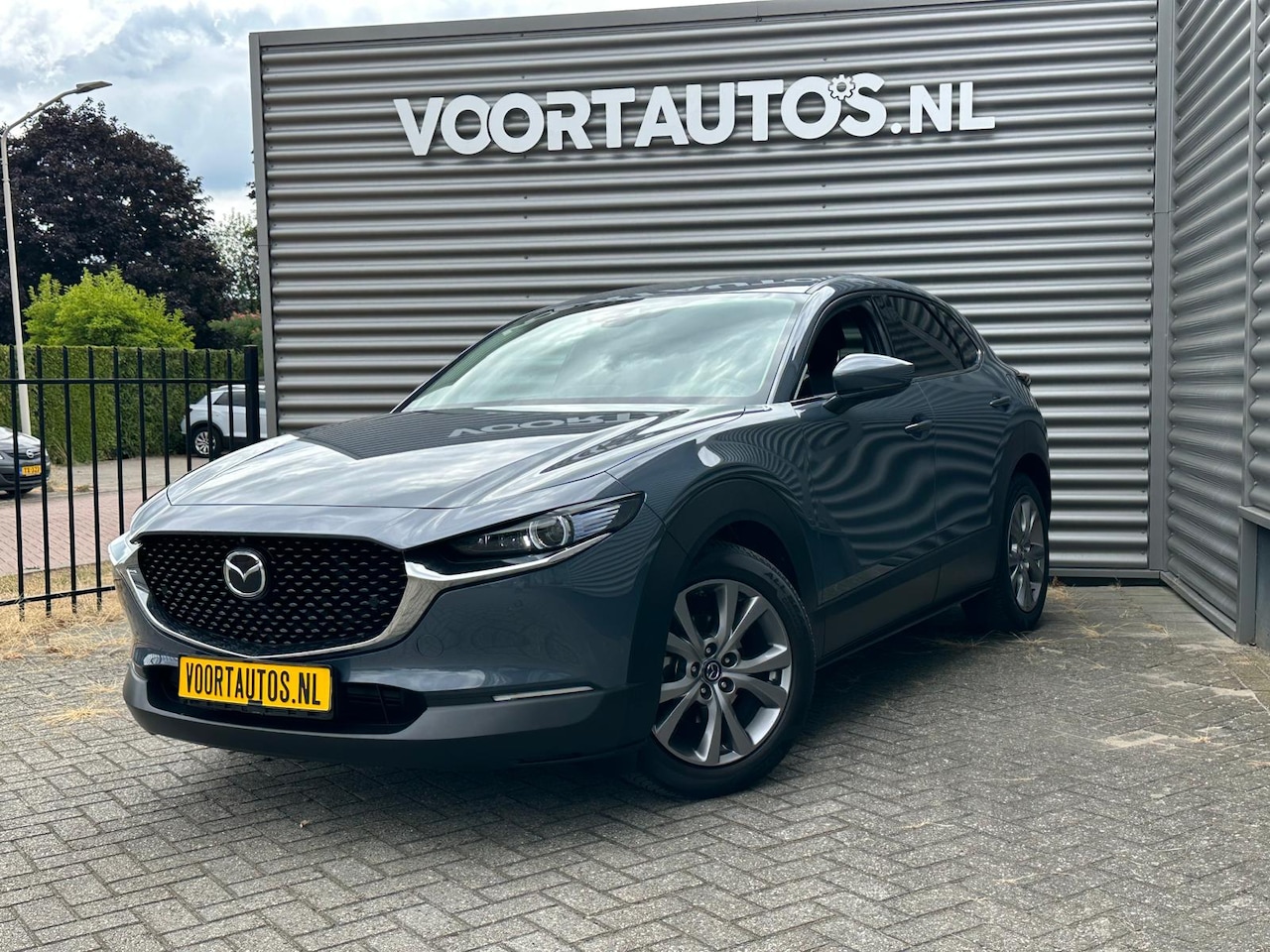 Mazda CX-30 - 2.0 e-SkyActiv M Hybrid LUXURY | ELEKTRISCHE KLEP | BOSE | APPLE ANDROID |HEAD -UP | 360 C - AutoWereld.nl
