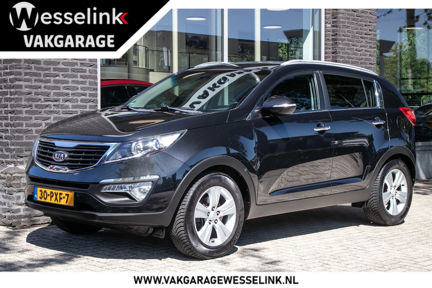 Kia Sportage - 1.6 GDI X-ecutive Plus Pack 1.6 GDI X-ecutive Plus Pack - AutoWereld.nl