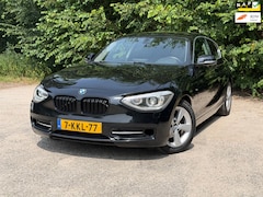BMW 1-serie - 114i EDE High Executive | Cruise control + Navi + Leder Nu € 4.950,