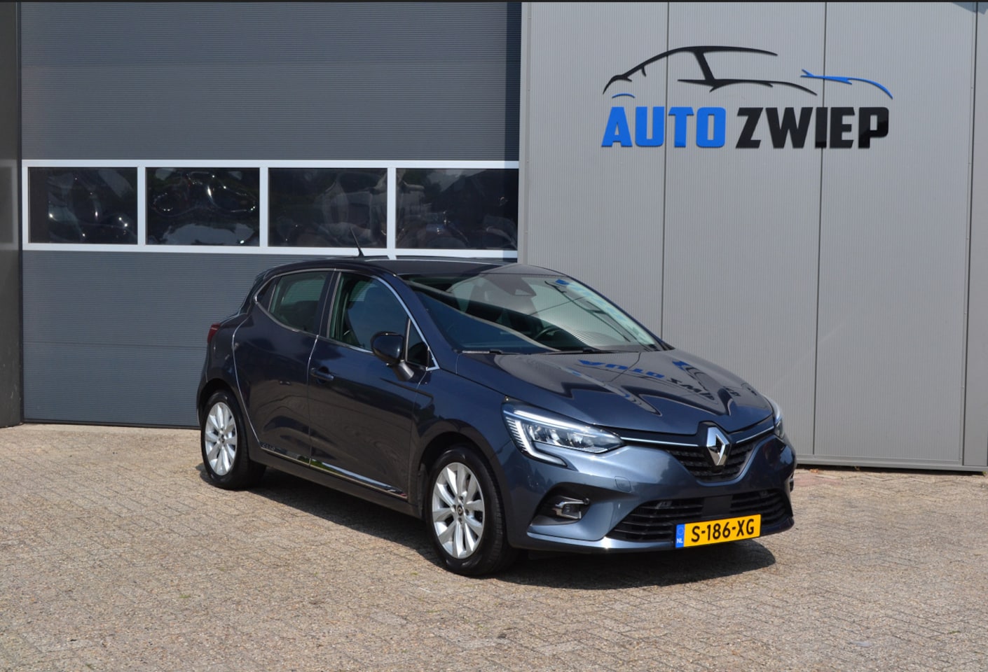 Renault Clio - 1.3 TCe Intens Stoelverwarming/camera/trekhaak - AutoWereld.nl