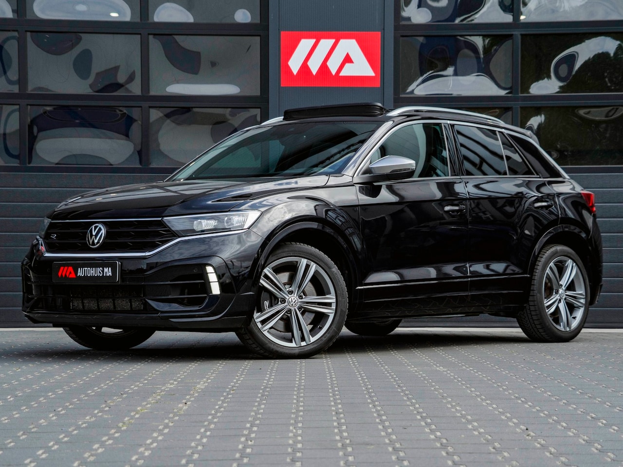 Volkswagen T-Roc - 2.0 TSI 4Motion R | PANO | LEDER | CAMERA | BEATS - AutoWereld.nl