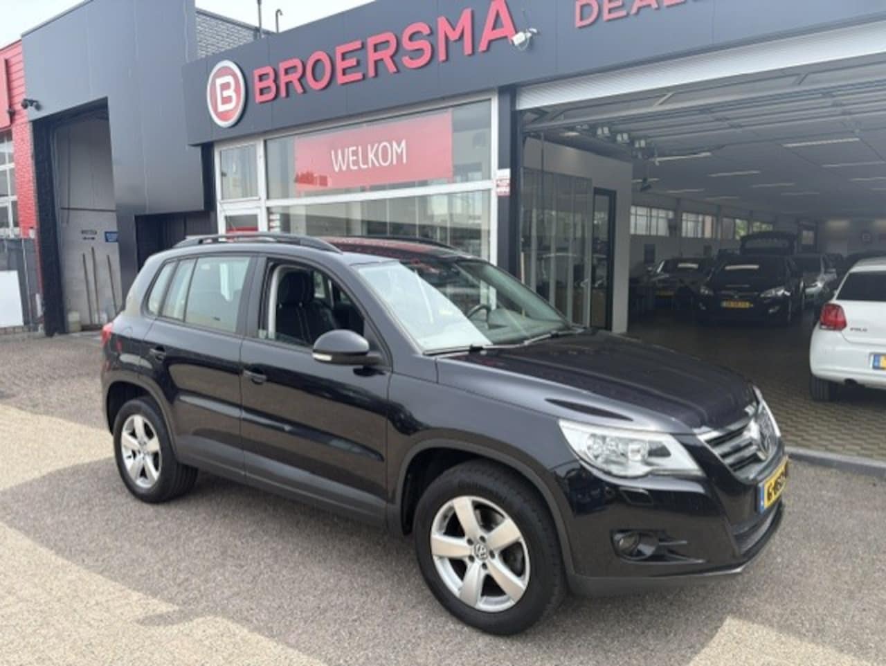 Volkswagen Tiguan - 1.4 TSI Sport&Style 1 EIGENAAR NL * DEALERONDERHOUDEN * - AutoWereld.nl